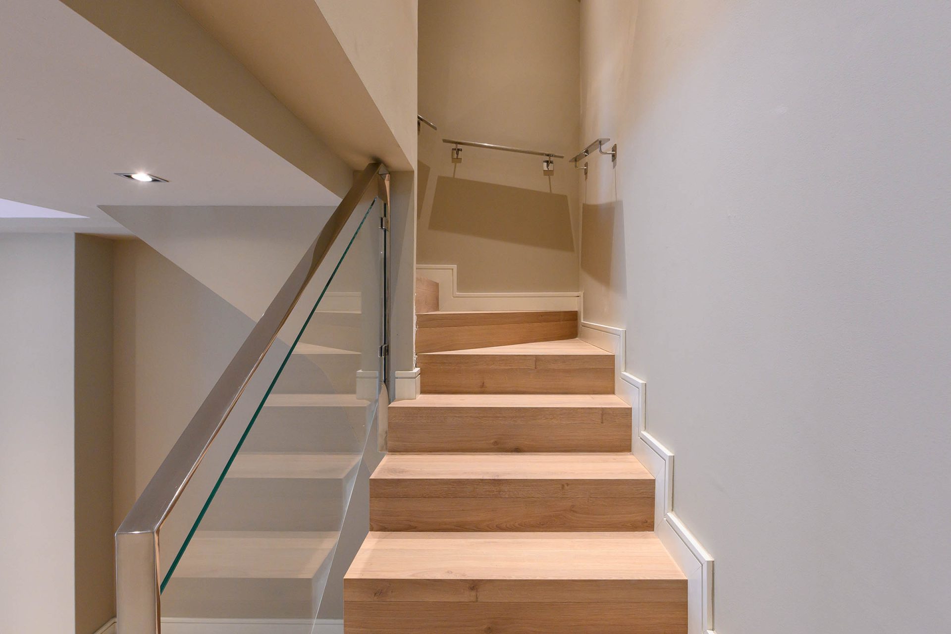 Wooden stairs with metal railings