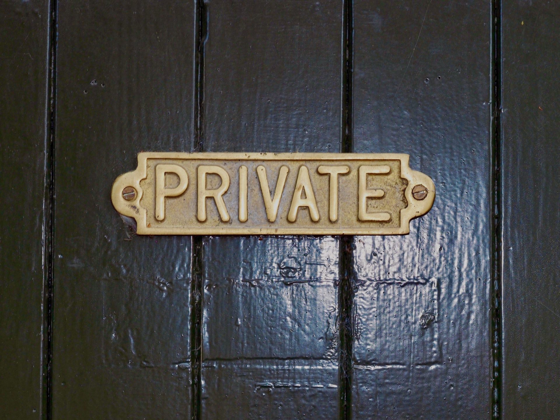 Door with brass sign
